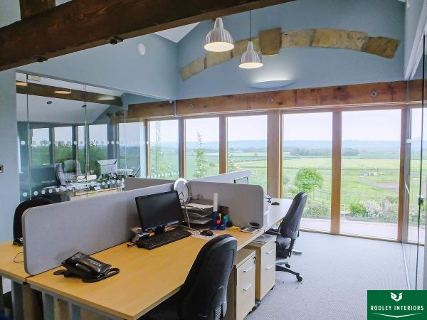 Frameless glass allows views of the countryside