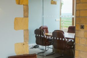 03, Standard height frameless glass door on a Manet style sliding track
