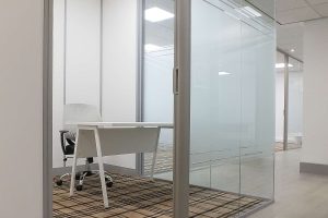 corner office with frosted film on the glazing