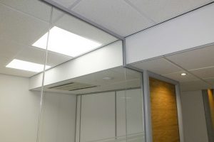 Glazing channel cut around ceiling bulkhead