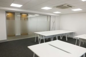 Light and open office spaces created using glass partitions