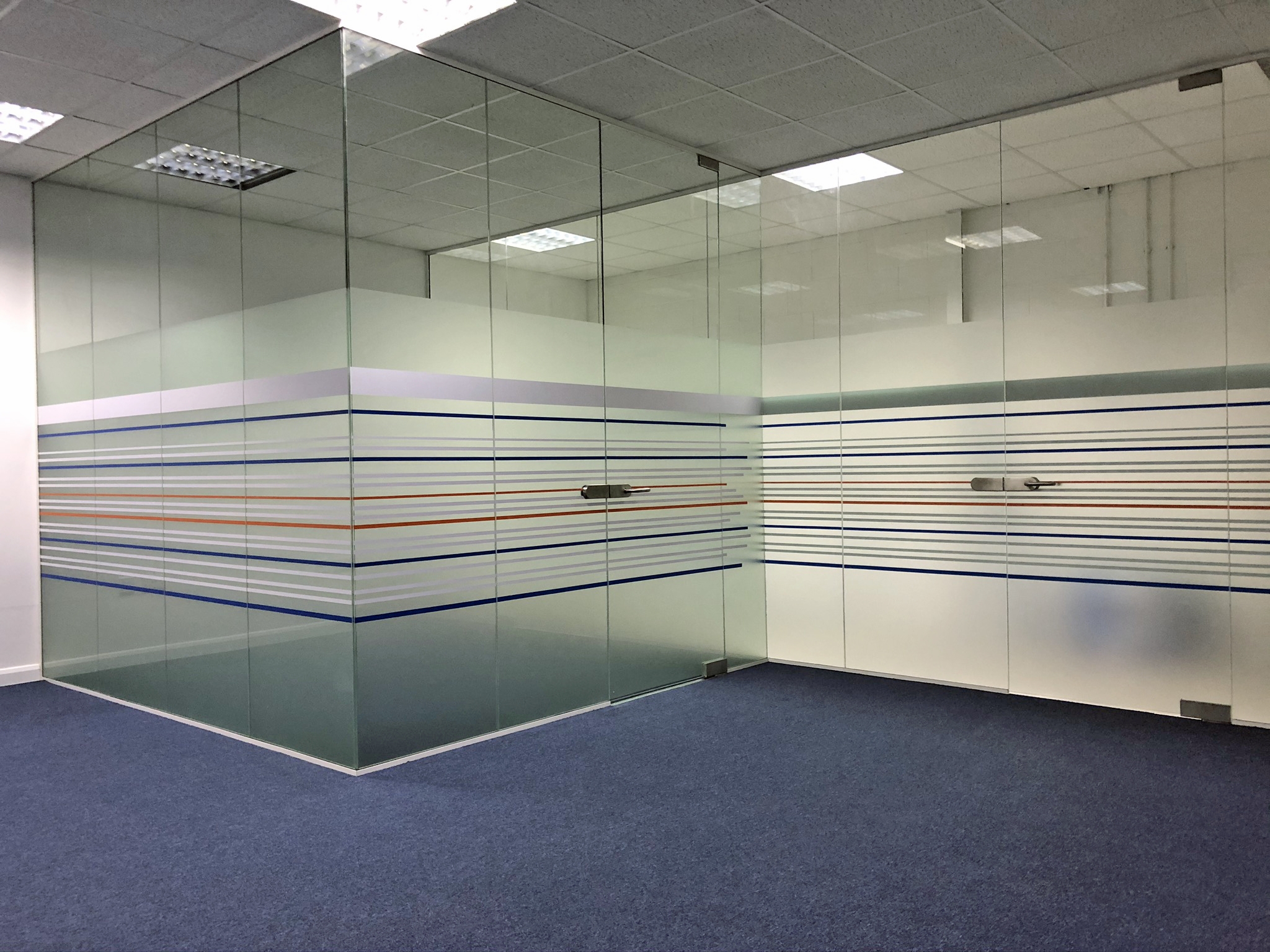Frameless glass office